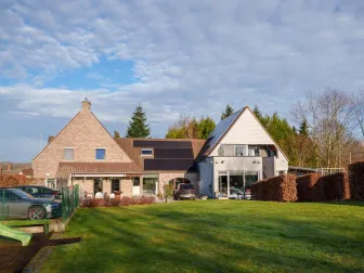 Uniek vastgoed met woonst en erkend vakantiecomplex (4★) in het hart van de Vlaamse Ardennen.